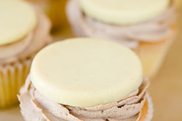 Cocoa Butter Cupcakes with Chocolate Whipped Cream and Homemade White Chocolate Toppers