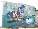 Mural De Una Mujer Pintando 
