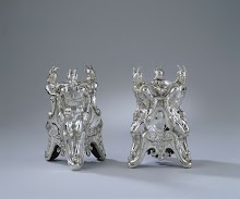 Two salt-cellars with satyrs