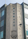 Barrat Building Crest