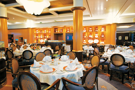 LEtoile_dining_room - L'Etoile offers fine décor, crisp linens and an array of tempting specialties, expertly prepared for guests on the Paul Gauguin.