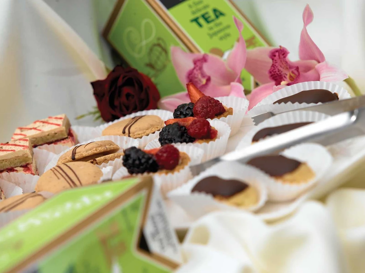 Oceania-High-Tea-2-2 - Satisfy your sweet tooth with colorful petit fours, delicate pastries and a selection of teas during your travels on Oceania Nautica.