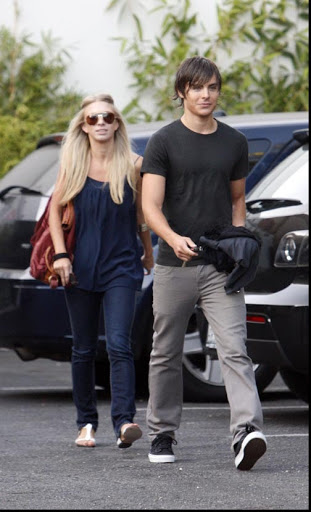 Fame Pictures (310) 395.0500
 
 Zac Efron is pictured leaving Smashbox Studios in Los Angeles, California this afternoon with an unidentified blonde. Efron was there for a photo shoot, and most likely showed off his newly acquired manly muscles for the camera!
 
  07/24/2008 --- Zac Efron --- (C) 2008 Fame Pictures, Inc. - Santa Monica, CA, U.S.A - 310-395-0500 / Sales: 310-395-0500