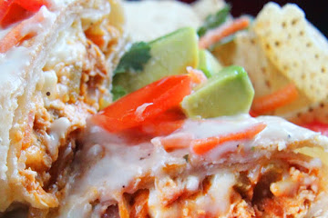 Smothered Buffalo Chicken Baked Burritos with Creamy Lime Ranch Sauce