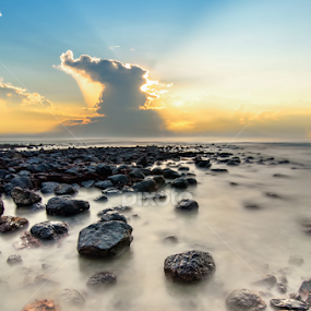 Slow shutter seascape with black stone when sun rising over sea by Shahril Khmd - Landscapes Sunsets & Sunrises