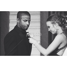 Attempting to pin the boutonniere! by Jenna Line - People Couples