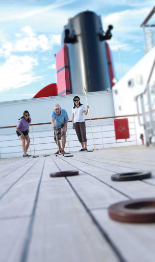 Cunard-Queen-Mary-2-shuffleboard - Is shuffleboard your thing? Soak in the beautiful weather and play a game on Queen Mary 2's Game Deck.