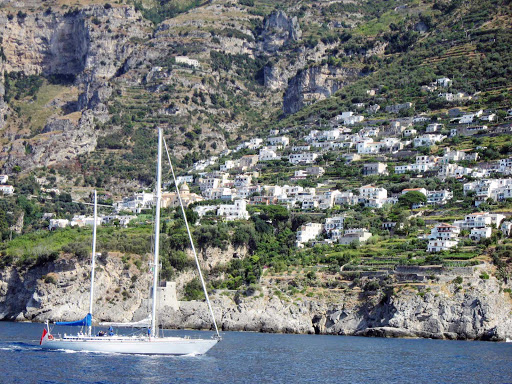 Sailboat off the Amalfi Coast of Italy.