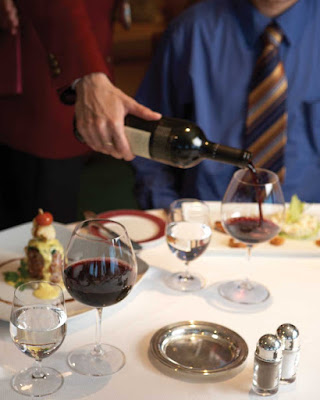 Oceania Regatta's sommeliers will ensure you are served premium wines to complement your meal while dining at the Polo Grill restaurant.