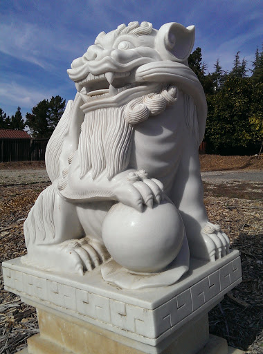 White Lion Sculpture Looking Right