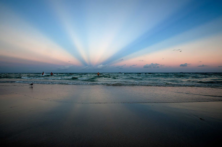 Play with the family in the surf at Miami Beach on your next Florida cruise.