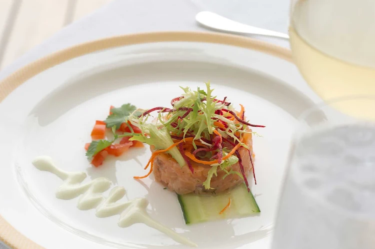 A seafood appetizer with garnish served on Queen Mary 2.