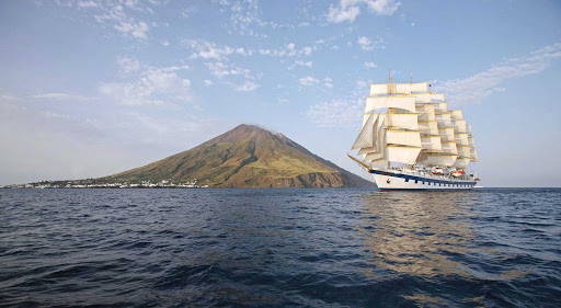 Royal Clipper passes Stromboli, one of the most active volcanoes on Earth. It's been erupting almost continuously since 1932.